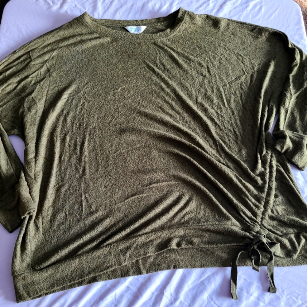 Soft sweater top with front left side embellishment